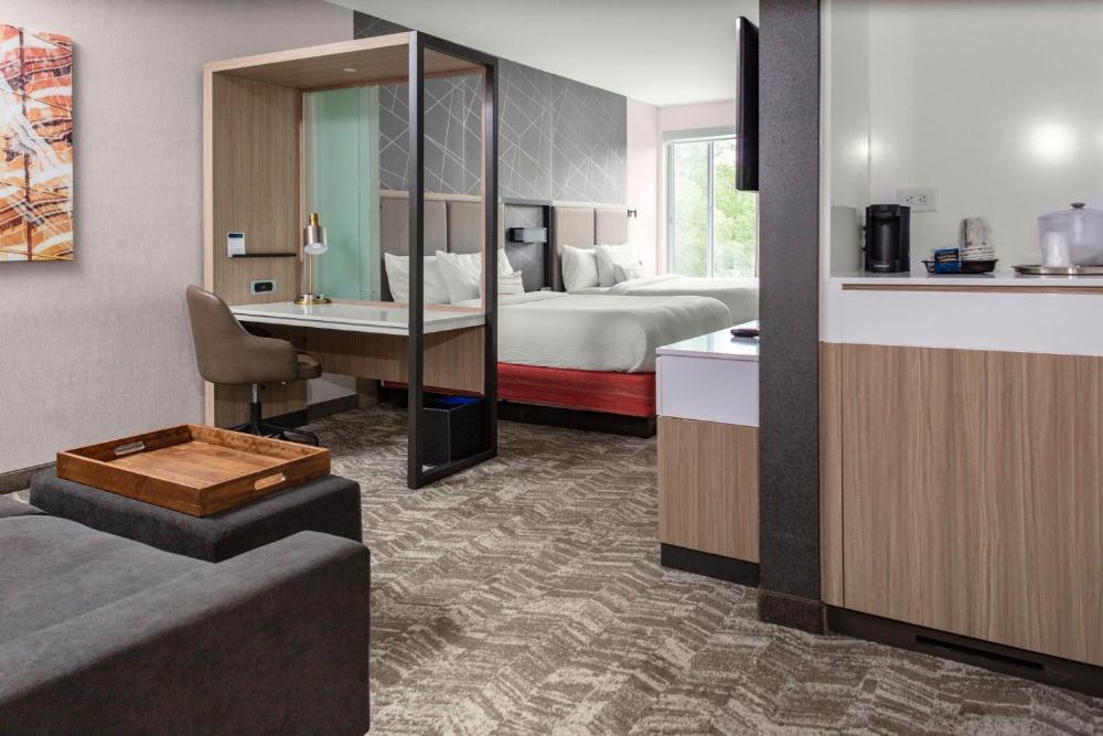 Queen Suite with Two Queen Beds and Trundle Sofa - Communication Assistance interior